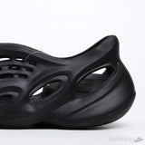 Yeezy Foam RNNR Onyx (Slight Def) - Photo 8